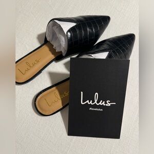 Brand new black pointed-toe slides!